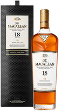 Amber colored The Macallan 18 Year Old Highland Single Malt Scotch Whisky bottle and black textured Sherry Oak Cask gift box.